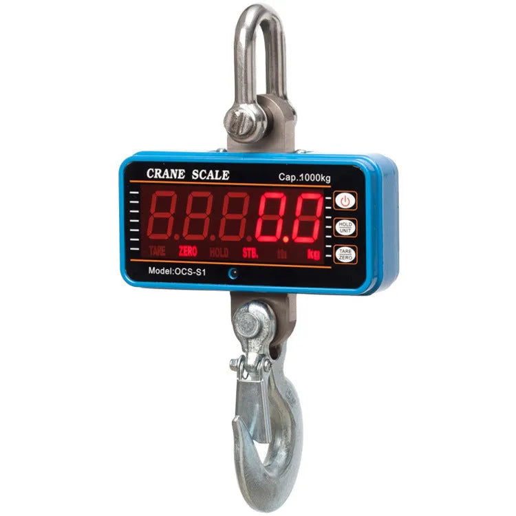 Orange electronic crane scale with digital display, shown suspended from a hook.