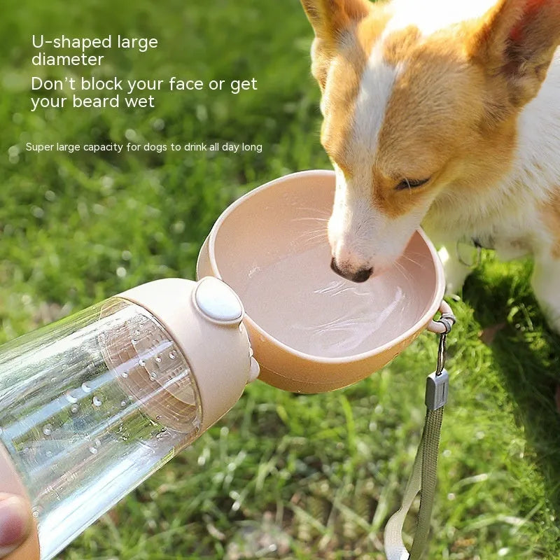 Portable dog water bottle and feeder bowl in brown, pink, or yellow colours.