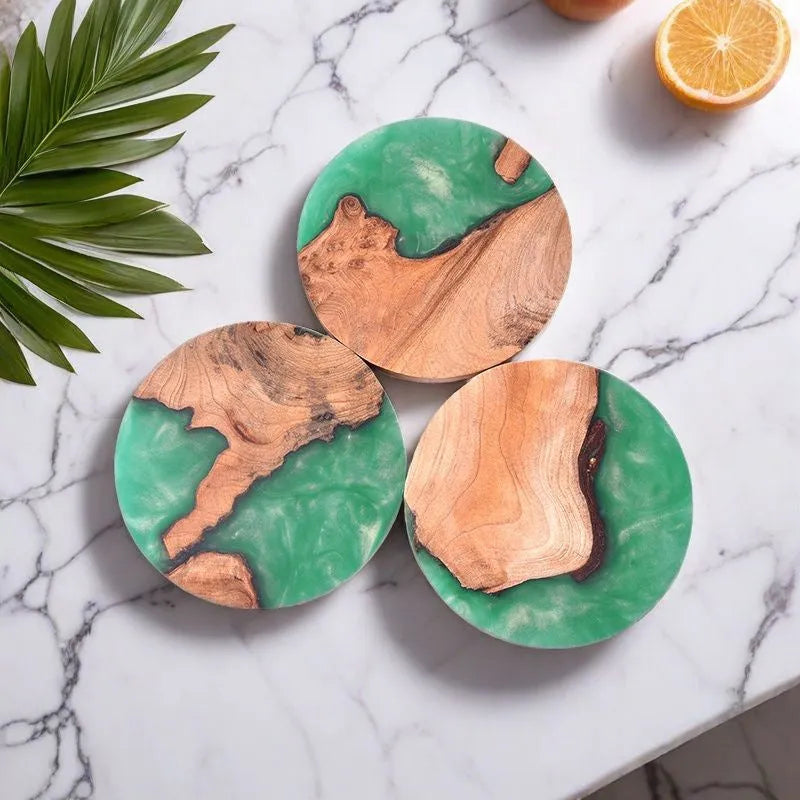 A solid wood resin coaster in a Nordic style, showing a round tumour green pattern on a 9.8cm wide, 1cm thick base.