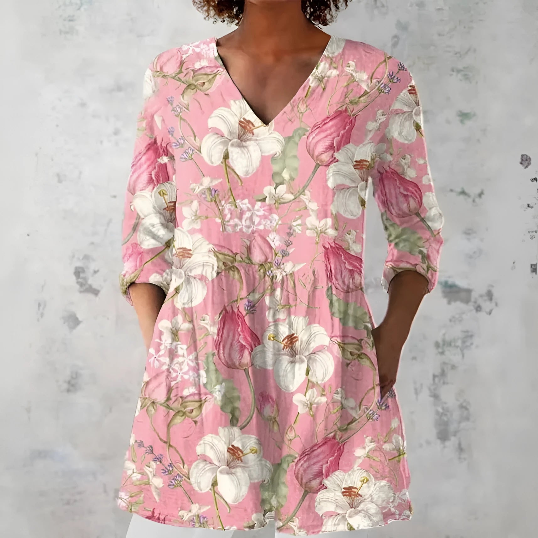 Women wearing a retro-style slim fit long-sleeved top with a digital print pattern.