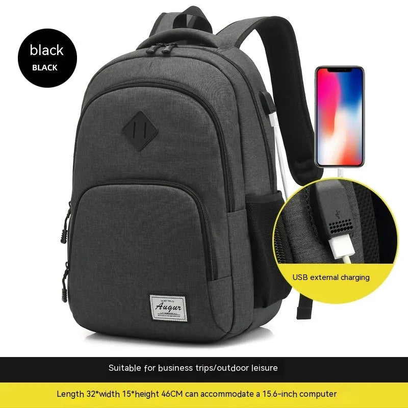 Simple grey and black nylon backpack with USB charging port on side strap.