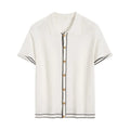 White short-sleeve cardigan with dark contrast lapels, buttoned front, and relaxed fit.