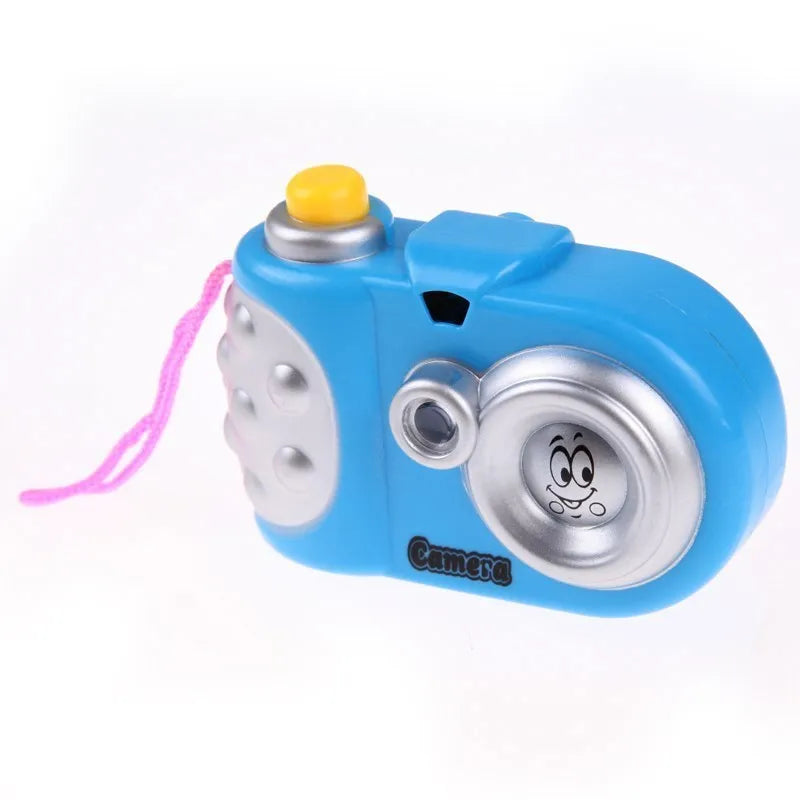 Blue and pink kids projection camera toy showing animal images with sliding lens