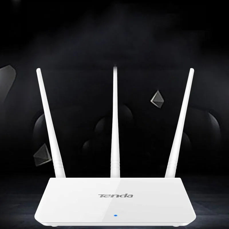 White Asus RT-AX57 Go WiFi 6 router with multiple antennas on a wooden desk