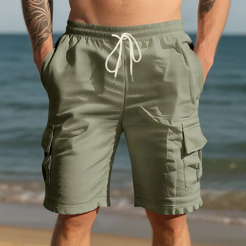 Men's straight-leg linen casual shorts in a light blue colour, showing front view with pockets.