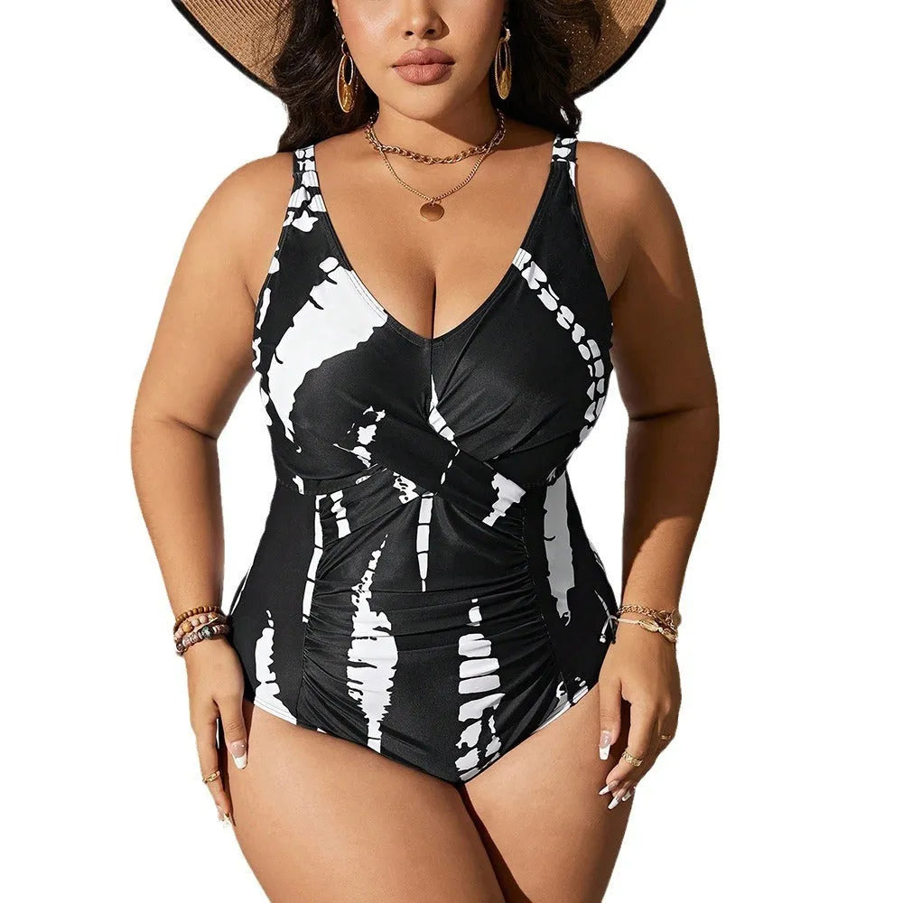 Black colour matching one-piece swimsuit with conservative cut and sleeveless design on mannequin