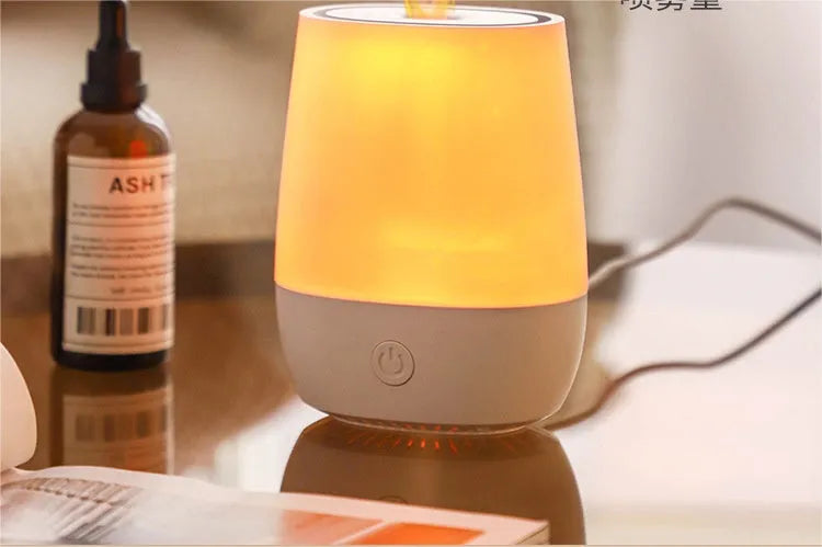 White Creative New Flame humidifier aromatherapy machine with simulated flame effect on a surface