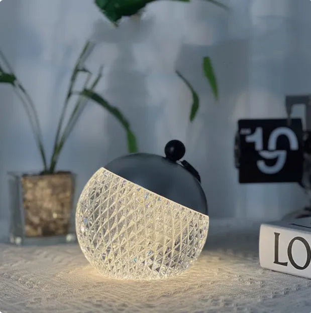 Portable touch dimmable LED desk lamp in chrome colour with 12cm diameter minimalist design