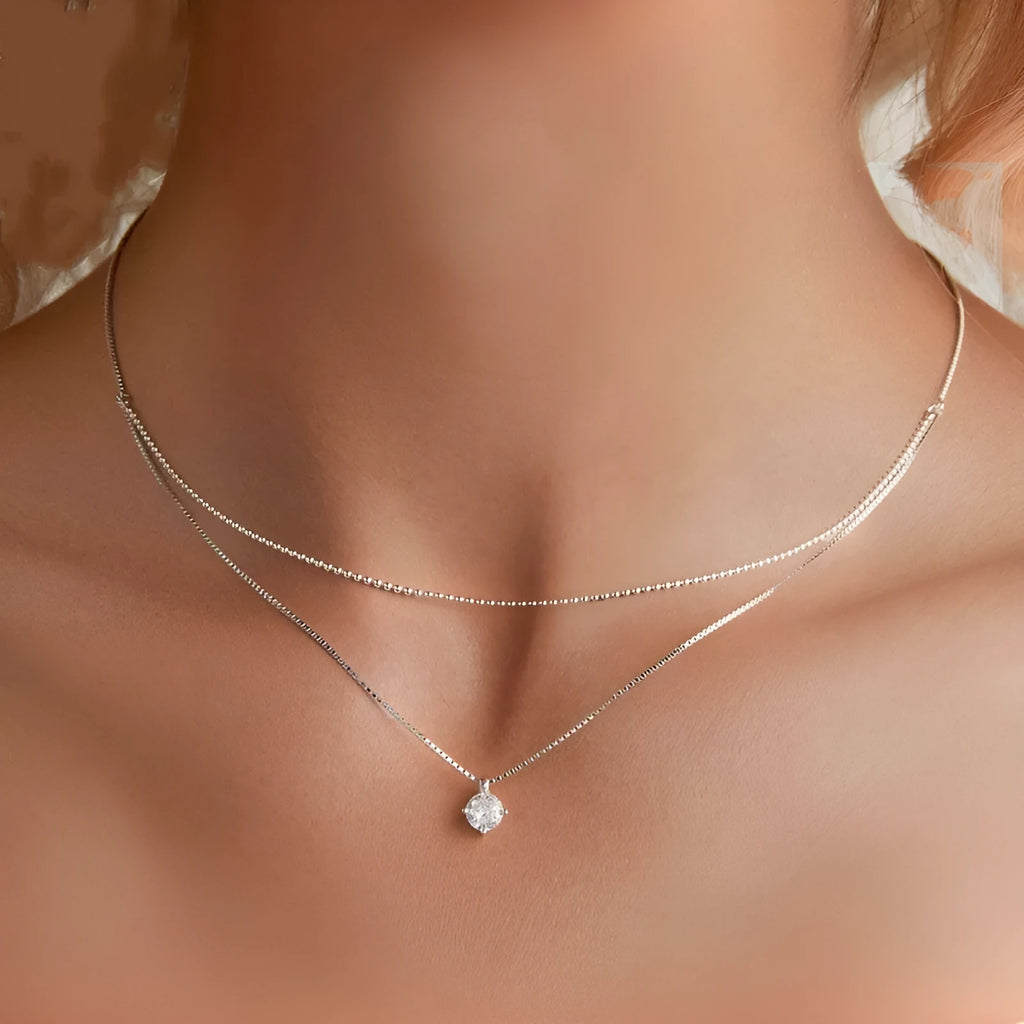 Sterling silver double-layer necklace with pearl chain design and pendant