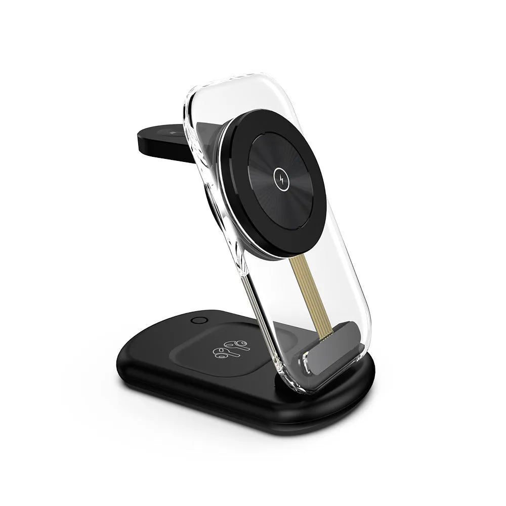 Transparent foldable magnetic wireless charger showing internal coils, unfolded on a table next to a smartphone.