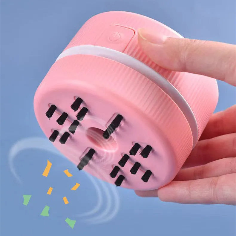 Mini handheld desktop vacuum cleaner in blue colour for pencil chip and soot removal