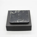 Real marble wireless charger with aluminium alloy base on desk showing indicator light