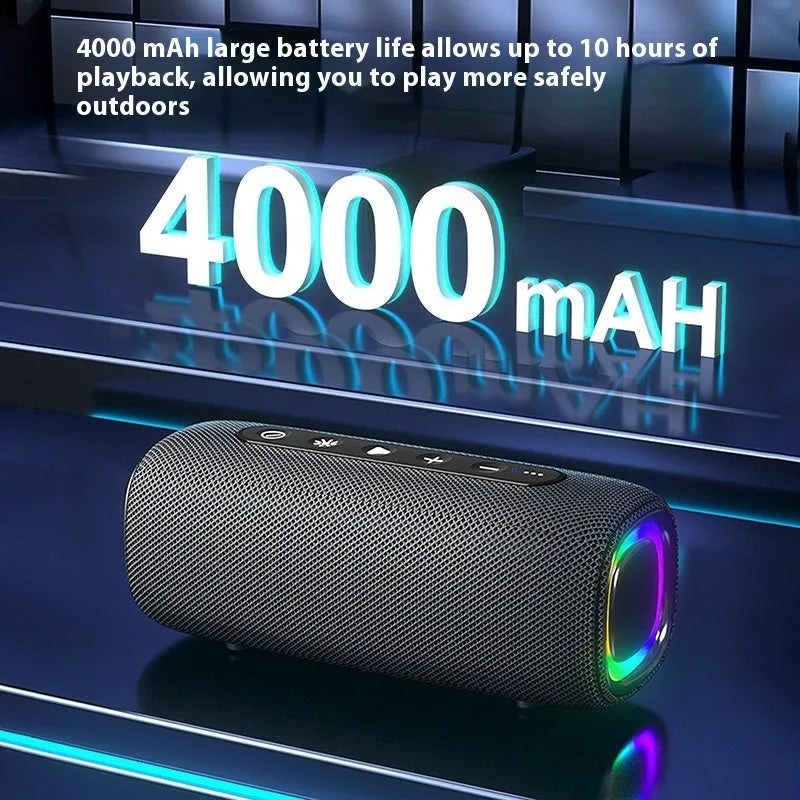 Outdoor portable wireless Bluetooth speaker in gray with cloth grille and button controls, 4000mAH battery