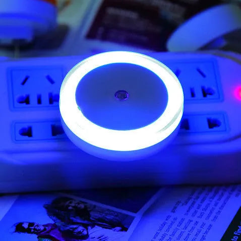 Round halo shaped LED induction nightlight with motion sensor in blue, red, white, and yellow colour options.