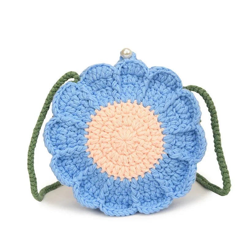 Hand-woven crochet shoulder bag with wool flowers and round suitcase shape