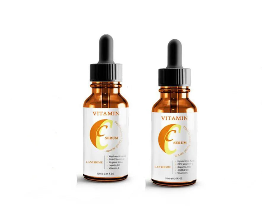 Bottle of Vitamin C and hyaluronic acid facial serum for skin brightening and anti-aging.