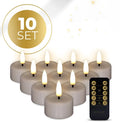 Set of four taupe-coloured LED tealight candles with realistic 3D flame effect showing flickering light