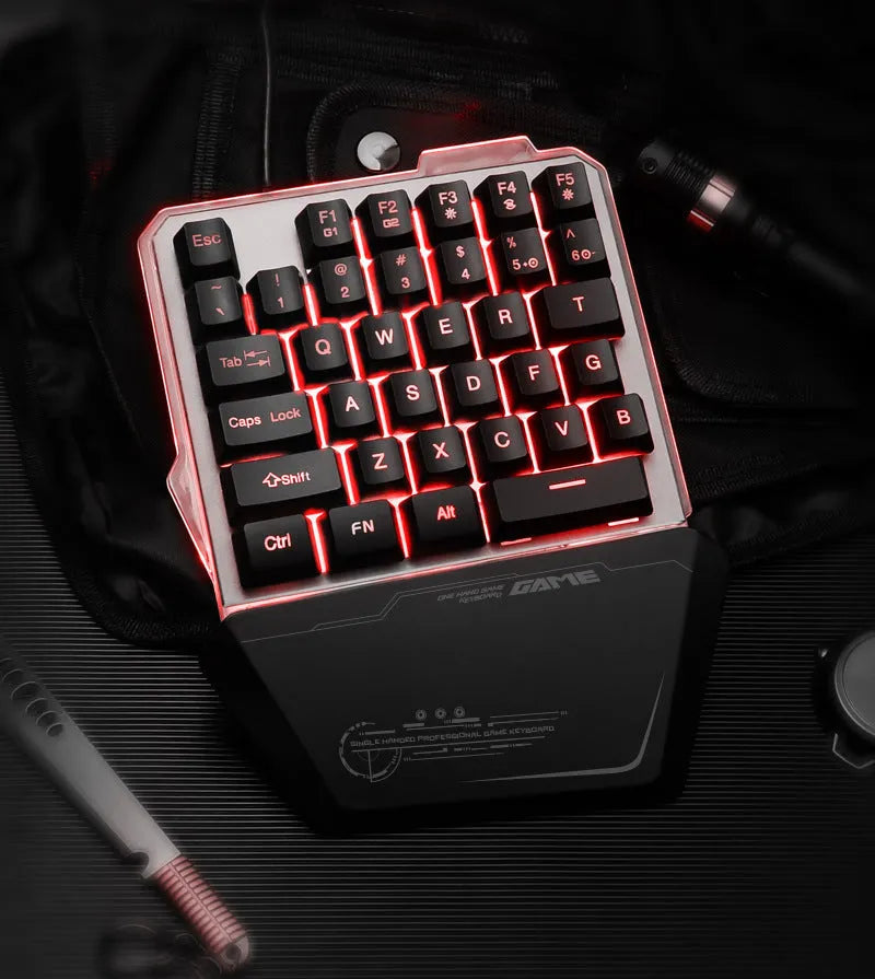 Black Robotic G40 one-handed mechanical keyboard with RGB backlit keys on a desk
