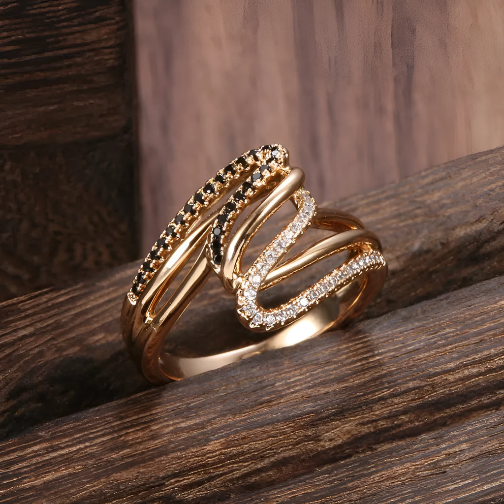 Gold tone women's copper ring with micro-inlaid sparkling zircon stones on a finger.