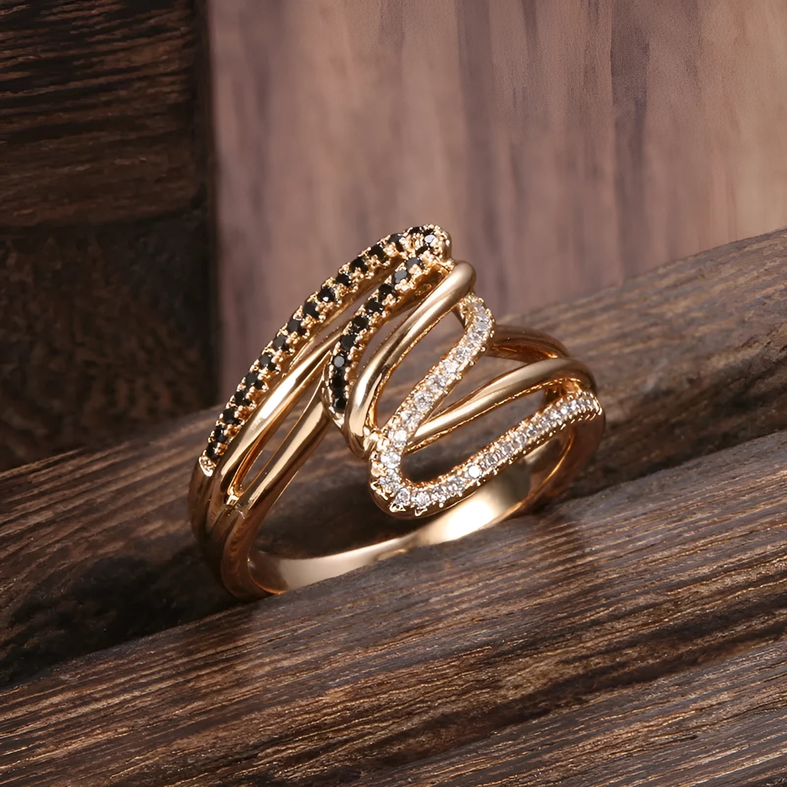 Gold tone women's copper ring with micro-inlaid sparkling zircon stones on a finger.