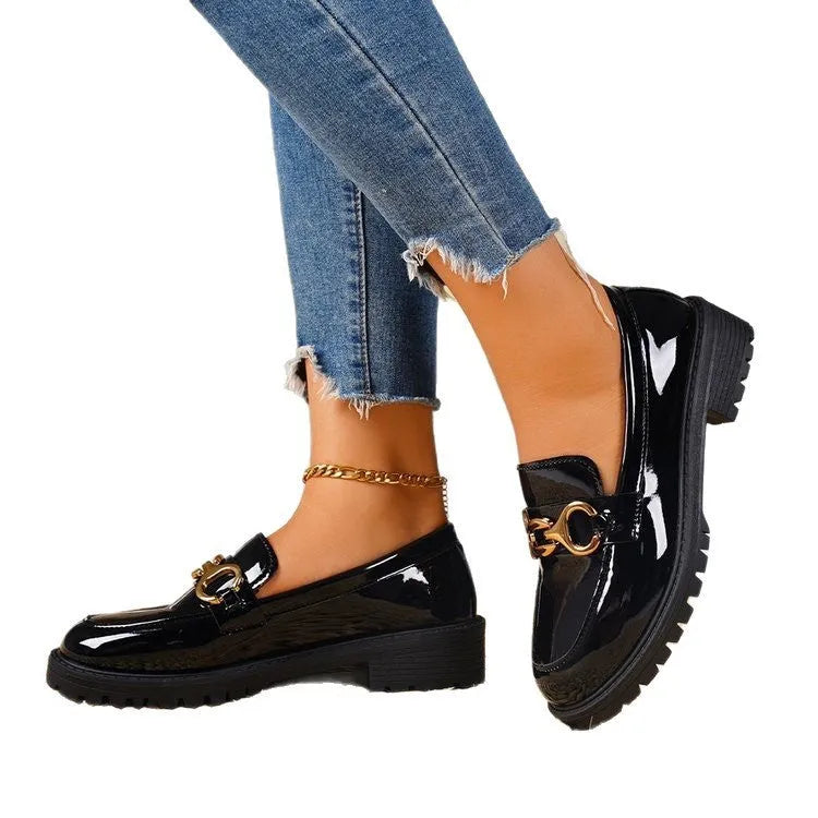Chunky heel round toe pumps in black with metal accent, thick sole, PU upper and rubber sole