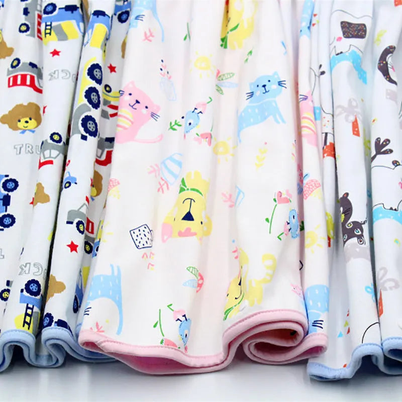 Waterproof baby diaper skirt with organic cotton surface, adjustable waist, and multi colour options including Bear car and Cat.