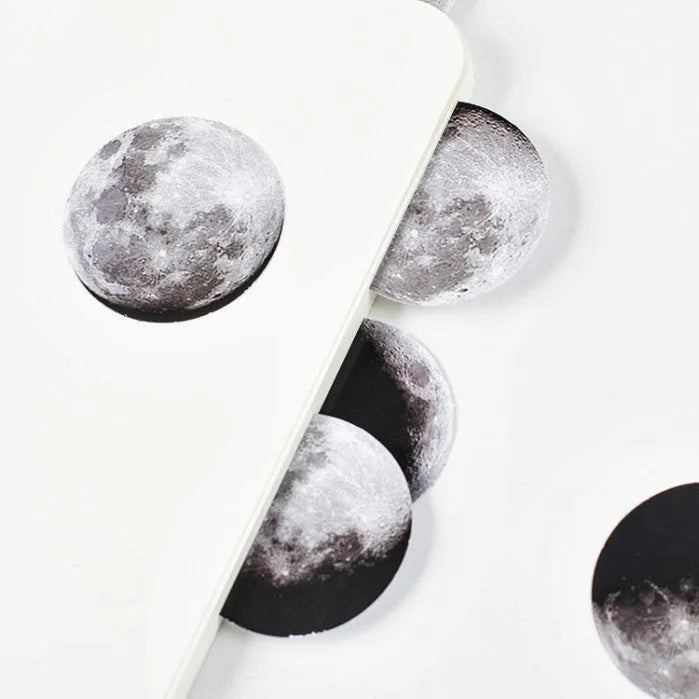 Boxed set of 45 black moon phase and calendar planet self-adhesive stickers.