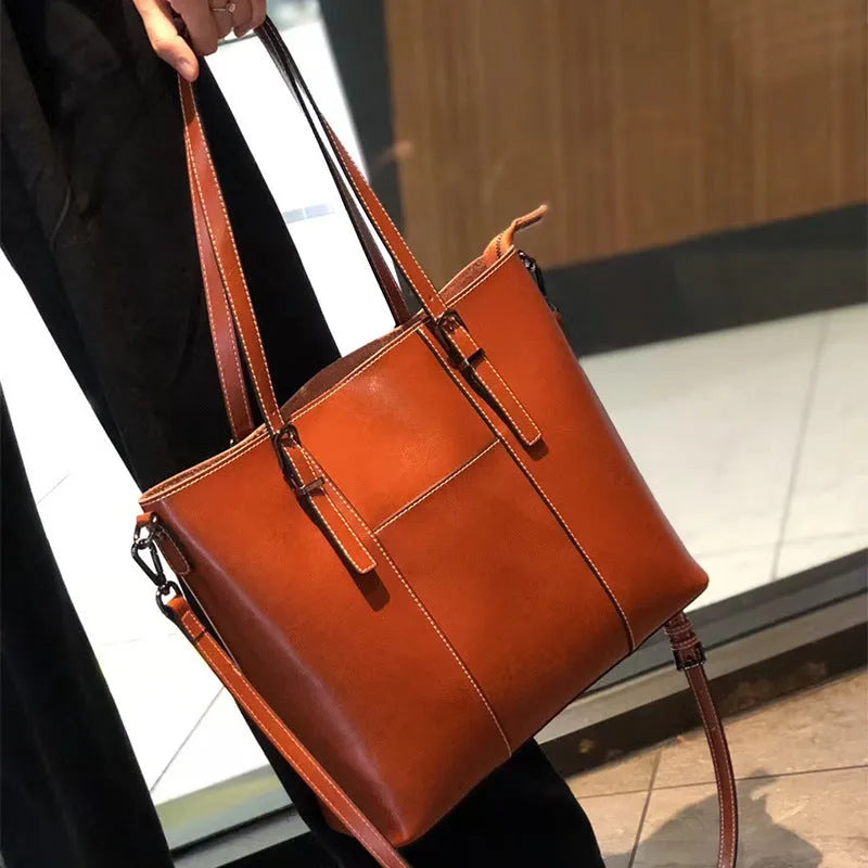 Brown genuine leather women's retro shoulder bag with three straps and multiple pockets