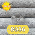 Oval denier open mouth ring with 6x8 main stone and five-pointed star design
