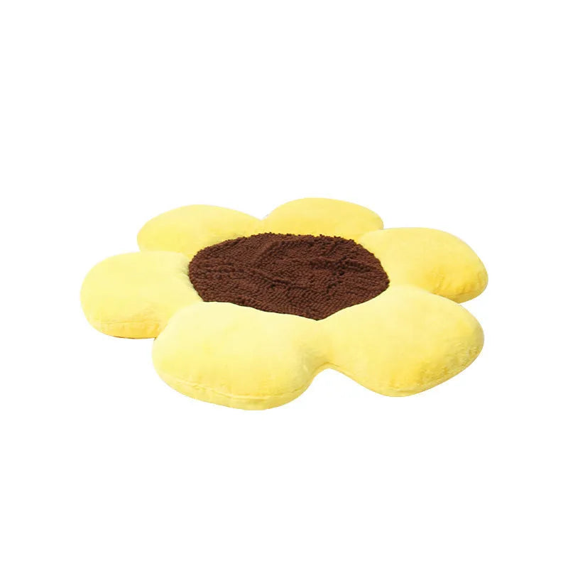 Round blue cat bed with high plush walls and soft filling, shown on a wooden floor.