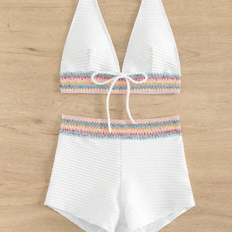 Women's high-waisted bikini suit in striped and solid colours