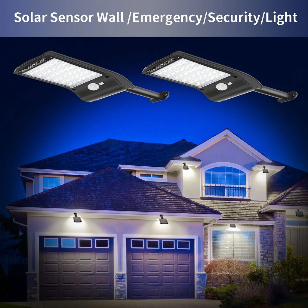 Black solar-powered LED wall light with motion sensor and diamond-patterned casing mounted on an exterior wall.