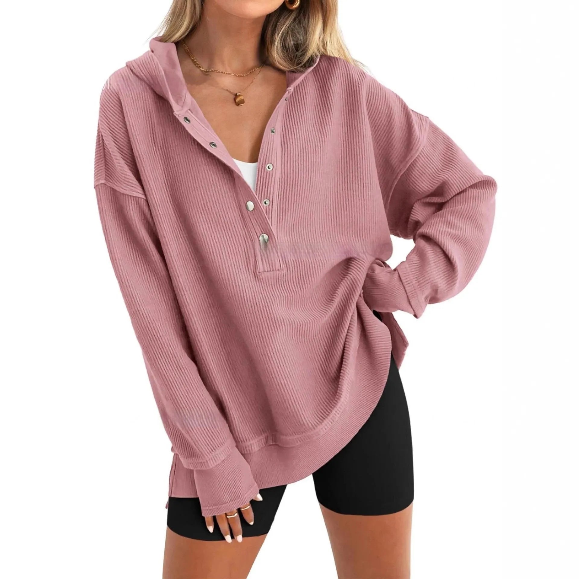 Women's solid colour loose-fit pullover sweater with raglan sleeves in peacock green.