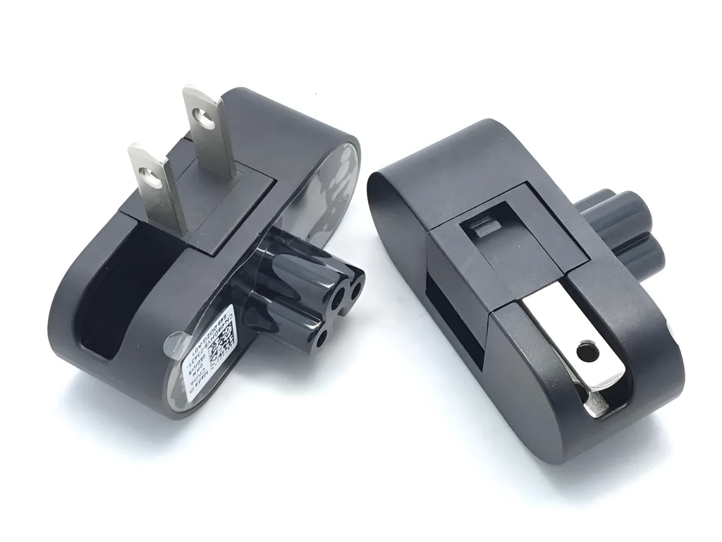 Black US notebook power head with a folding two-prong plug shown in straight and folded positions.