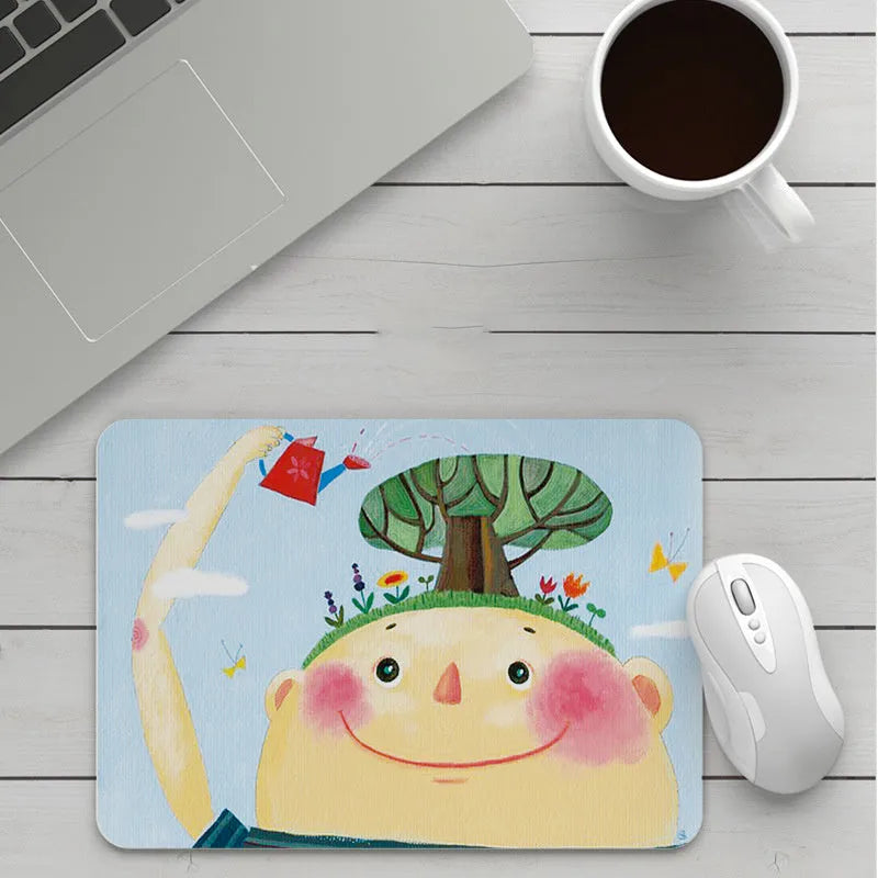 Thick custom cartoon mouse pad with colourful design on a desk, showing black seam edge