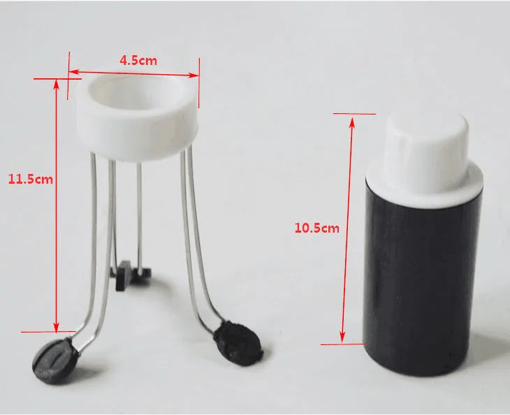 White and black automatic stirrer blender on a kitchen counter