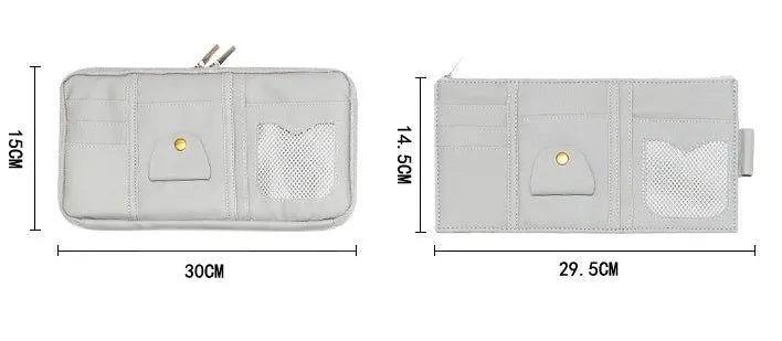 Car sun visor organizer made of PU leather with full leather wrap, showing zippered compartments and sunglasses clip