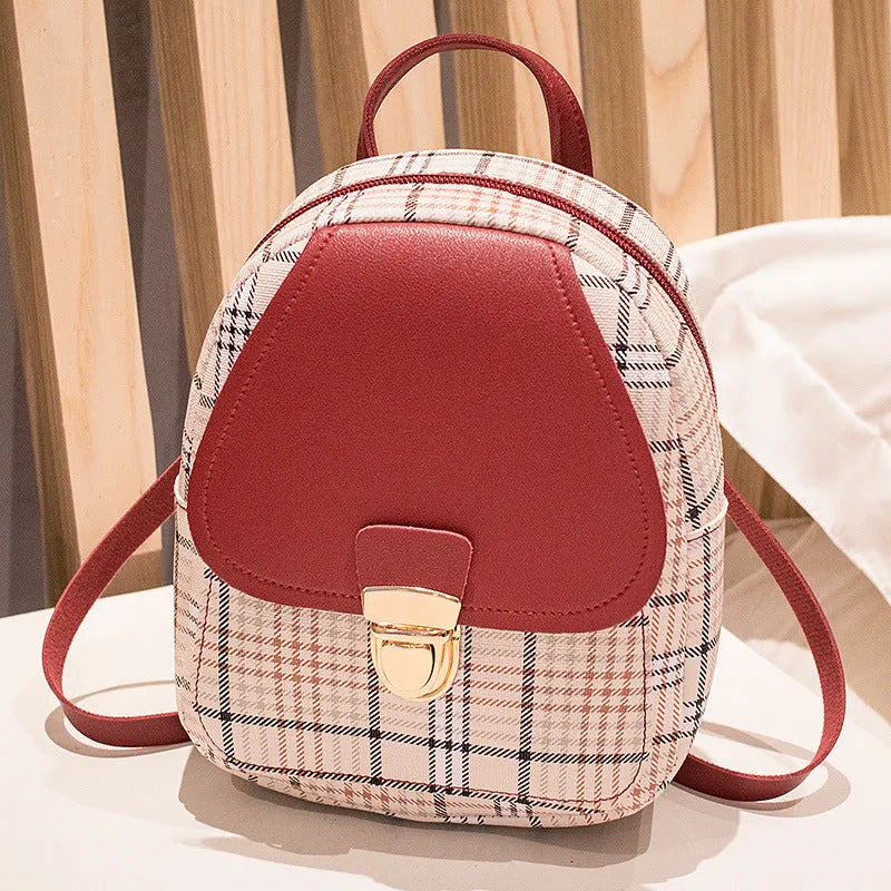 One shoulder diagonal phone bag in PU fabric shown in available colours: black, blue, brown, pink, red.