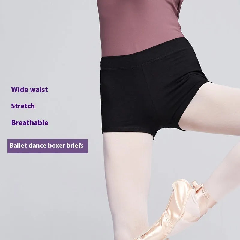 Black cotton women's ballet practice shorts laid flat.