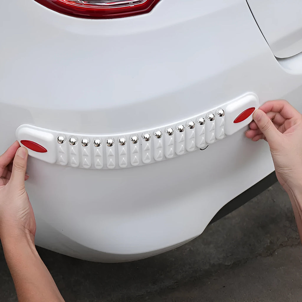 Set of four widened thickened PVC car bumper strips in black with stick-on backing for vehicle bumper protection