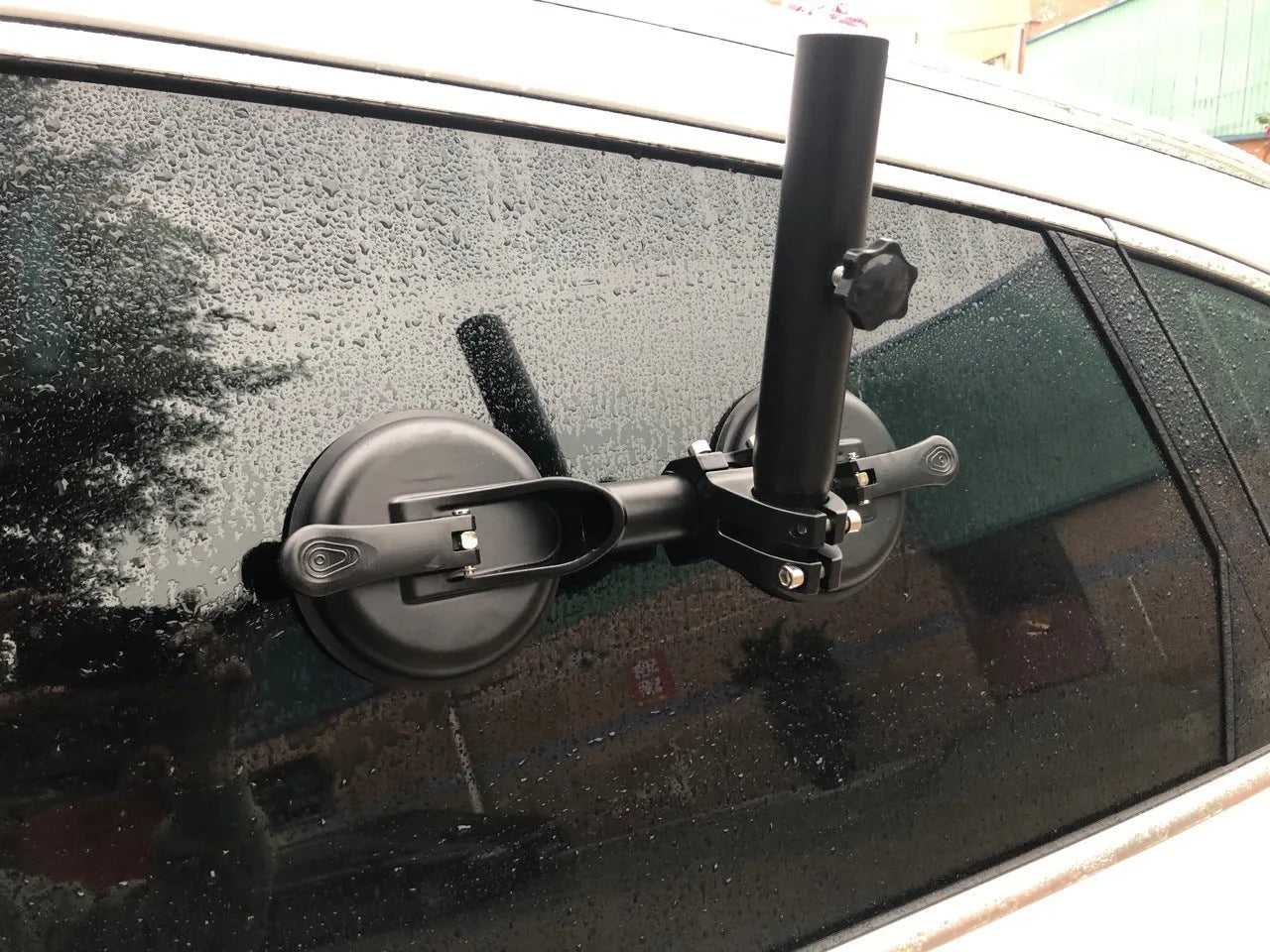 Black ABS off-road car sucker base with a round rubber suction cup for glass mounting.