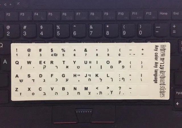 Sheet of glowing PVC keyboard stickers for Arabic, Thai, Hebrew, French, Italian and German languages