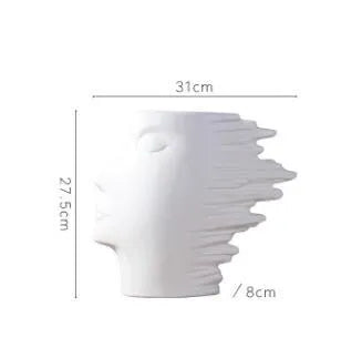 Nordic porcelain head ornament vase with matte finish, shown in black or white as a hanging decoration.