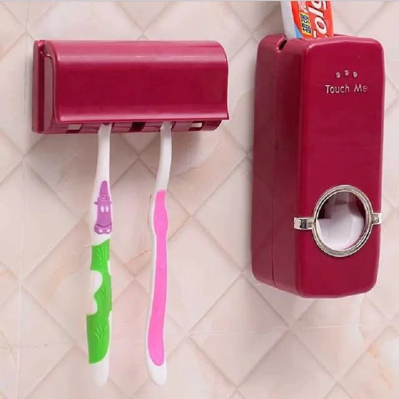 White adhesive plastic toothbrush holder set mounted on a smooth bathroom wall
