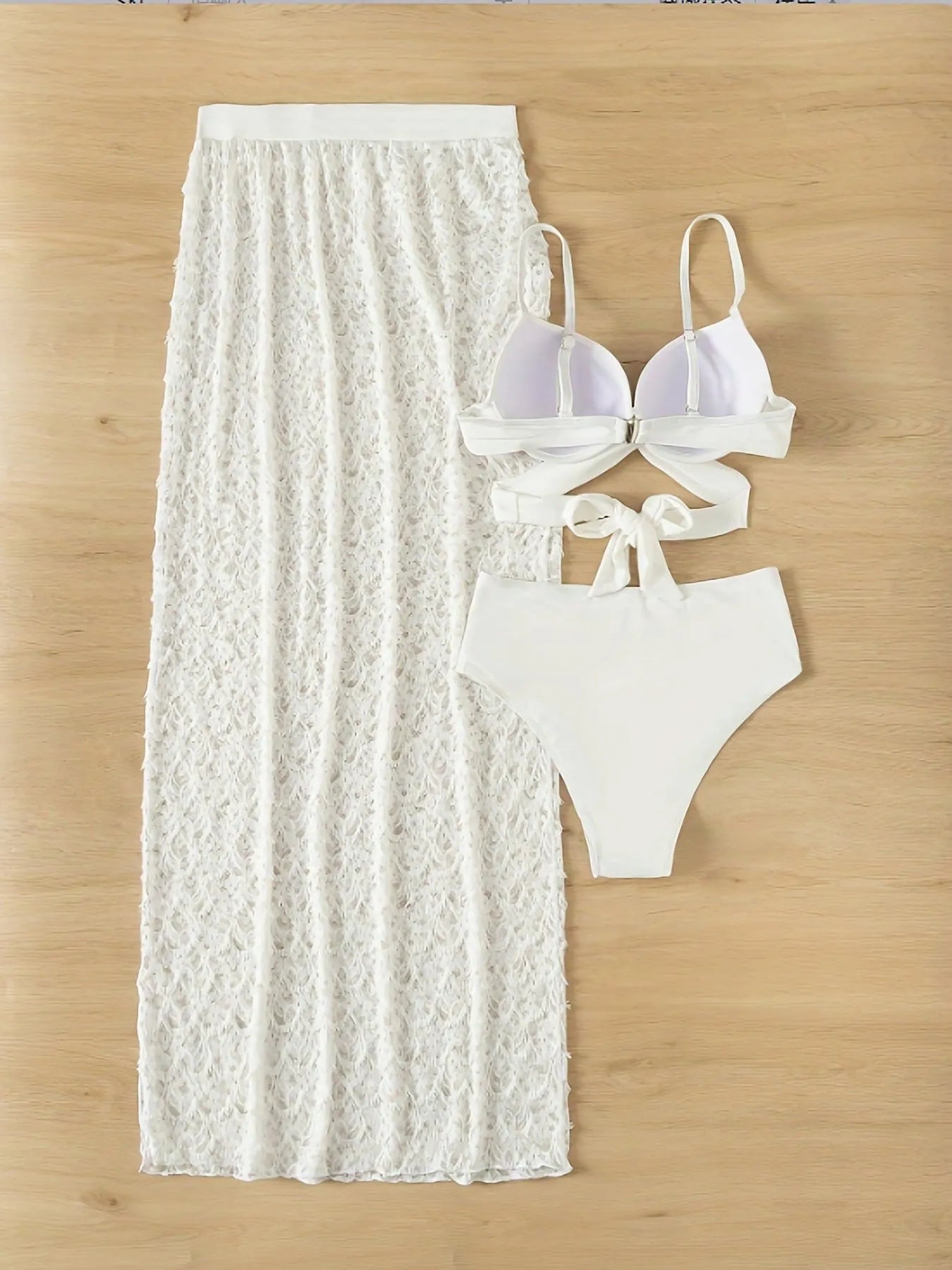 White three-piece swimsuit set with sleeveless top, briefs, and gathered long skirt for swimming sports