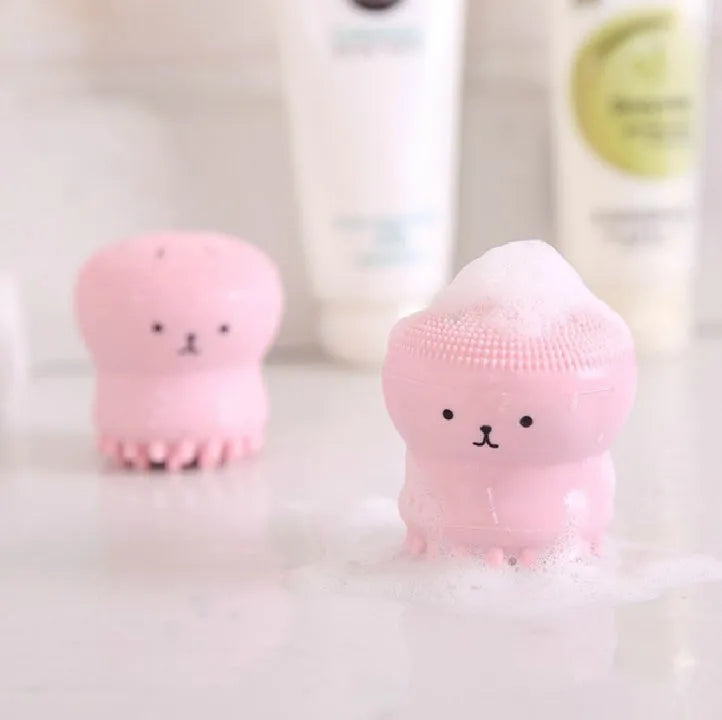 Cartoon octopus silicone foaming facial cleansing brush in pink for manual massage