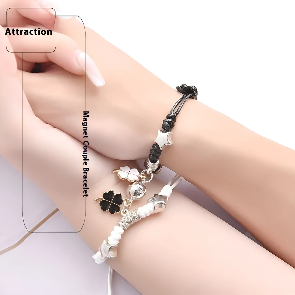 A pair of magnet couple bracelets in alloy with electroplated finish, showing styles like crown, clover, and love lock.
