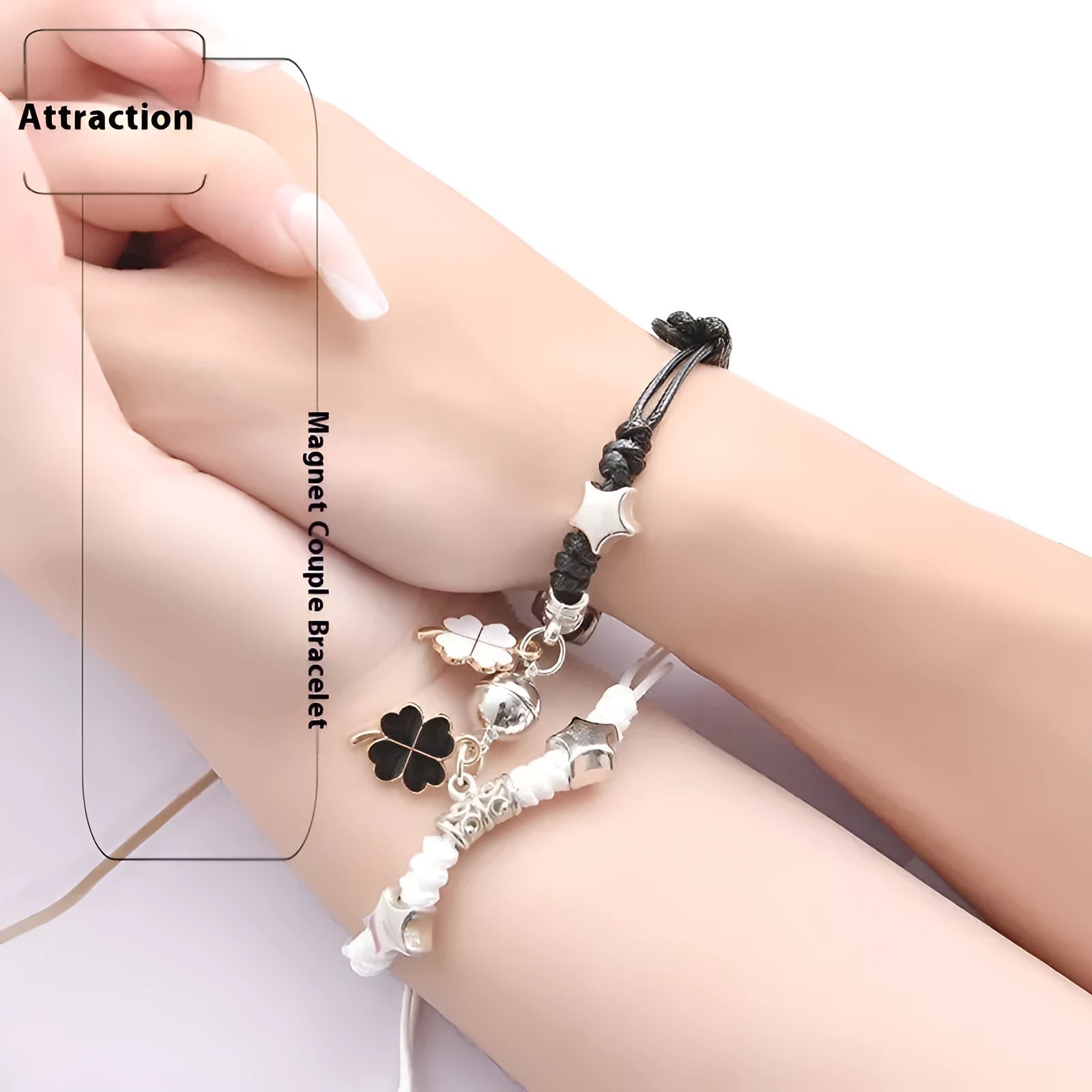 A pair of magnet couple bracelets in alloy with electroplated finish, showing styles like crown, clover, and love lock.