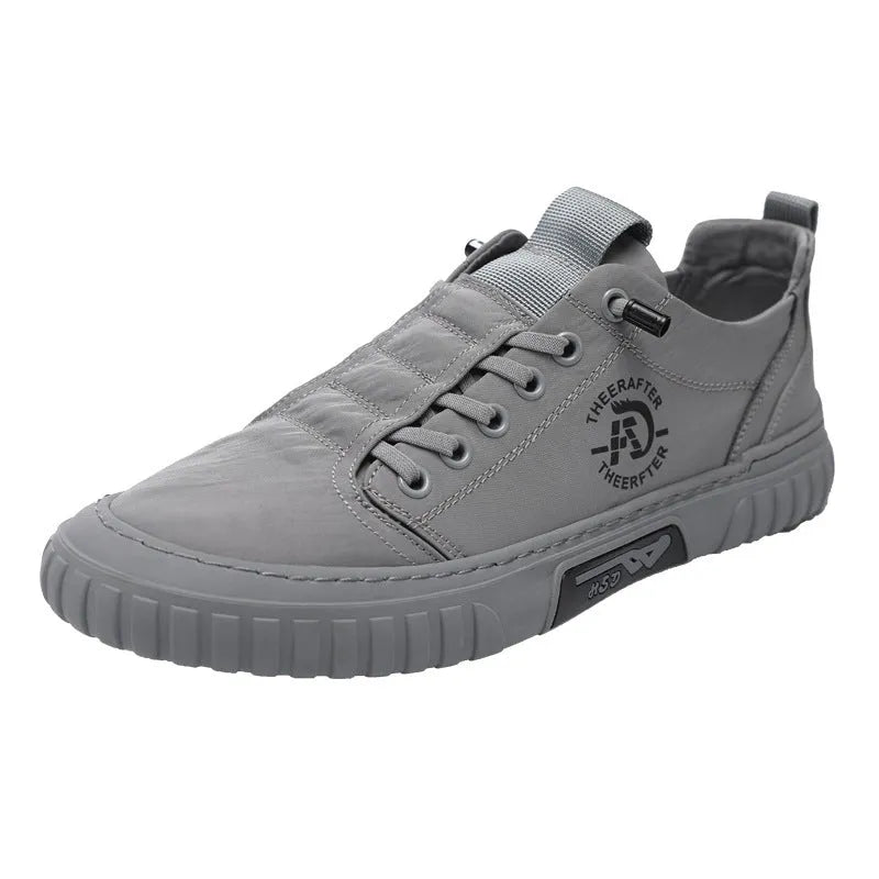 Men's breathable canvas casual shoes in black with round toe, flat rubber sole, and lace-up closure