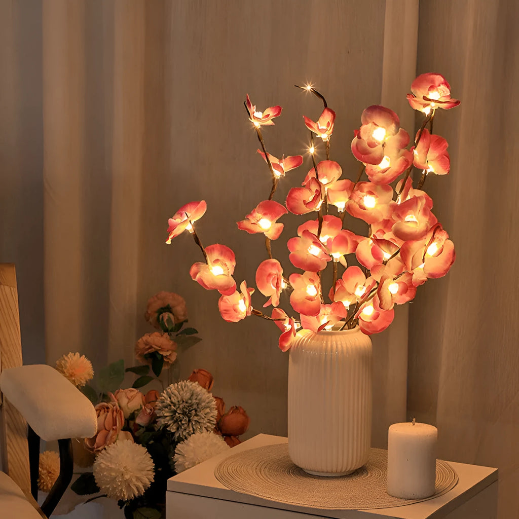 Pink phalaenopsis orchid branch LED light with fabric shade on a wooden surface, measuring 65cm long.